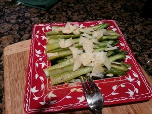 Asparagus with an olive oil vinaigrette and shaved Parmesan.
